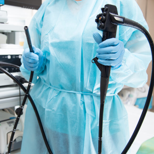 Doctor hold endoscope -- Cancer coverage from STAT