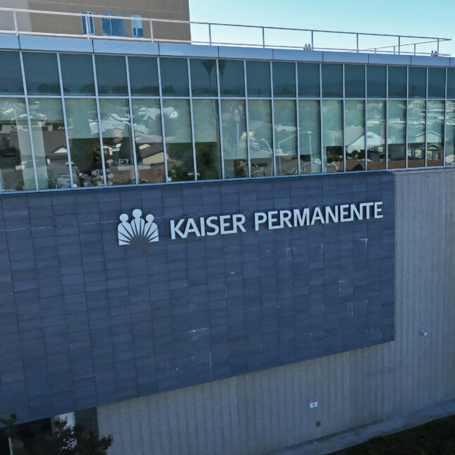 an aerial view, a sign is posted on the exterior of the Kaiser Permanente Vallejo Medical Center -- health tech coverage from STAT