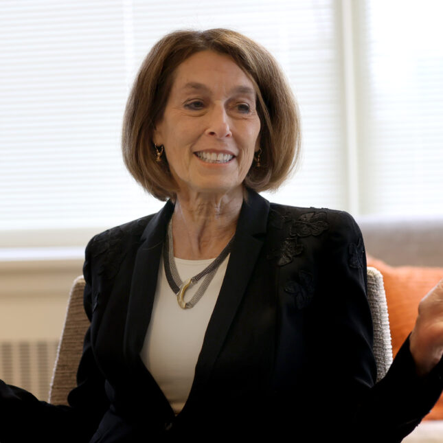 Dr. Laurie Glimcher, CEO of Dana Farber Cancer Institute, opens both arms while talking — first opinion coverage from STAT