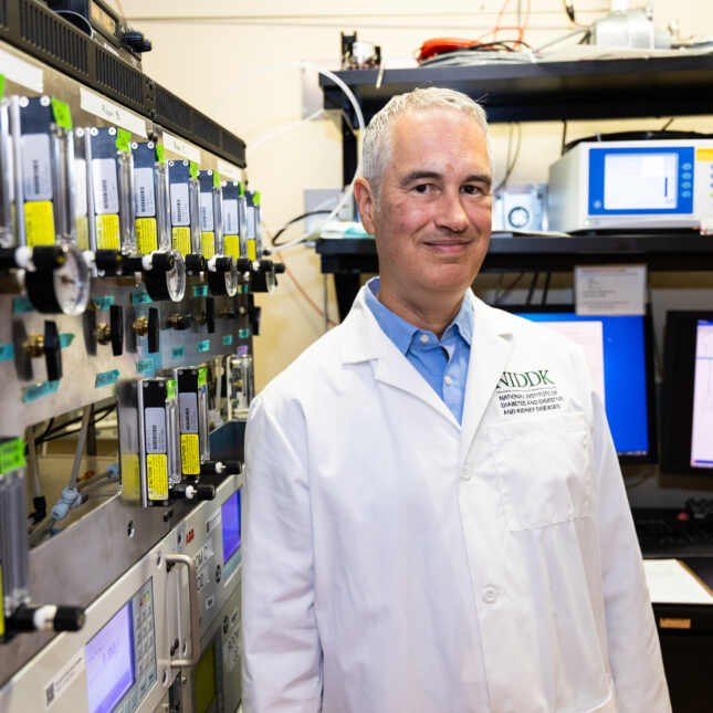 Kevin Hall, a researcher at the National Institute of Diabetes and Digestive and Kidney Diseases, poses for a portrait on Aug. 14, 2024, at the National Institutes of Health in Bethesda, Maryland. As Principal Investigator, Hall is leading a study to compare how ultra-processed versus unprocessed foods affect people’s energy metabolism. His laboratory also investigates mechanisms that control food choices, body composition, and energy expenditure.